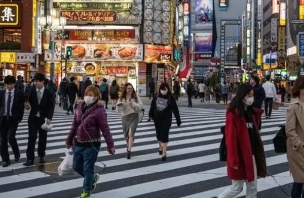 Jepang Turunkan Level Covid-19 Setara dengan Flu Biasa